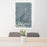 24x36 Rotonda West Florida Map Print Portrait Orientation in Afternoon Style Behind 2 Chairs Table and Potted Plant