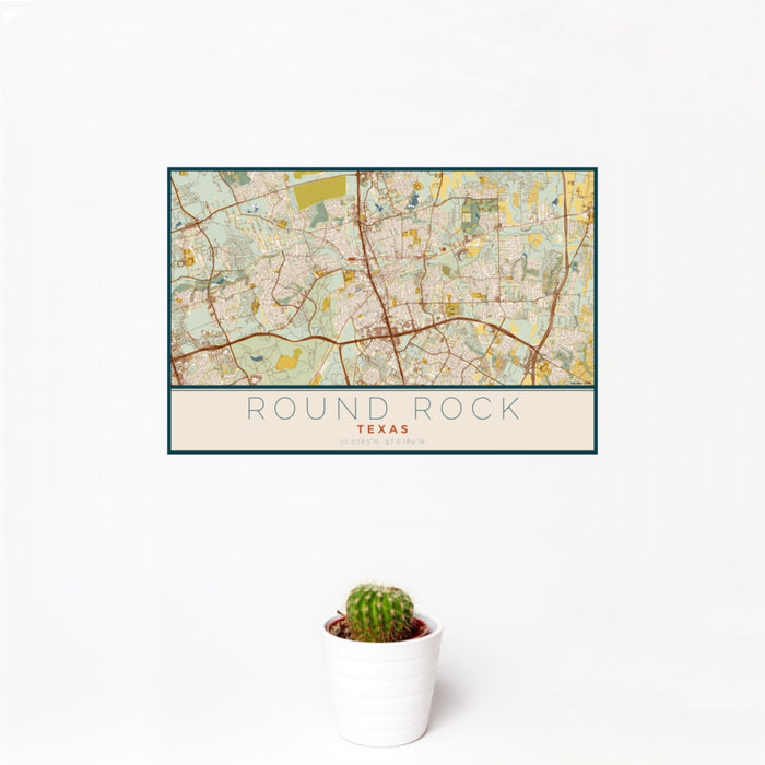 12x18 Round Rock Texas Map Print Landscape Orientation in Woodblock Style With Small Cactus Plant in White Planter