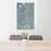 24x36 Round Rock Texas Map Print Portrait Orientation in Afternoon Style Behind 2 Chairs Table and Potted Plant