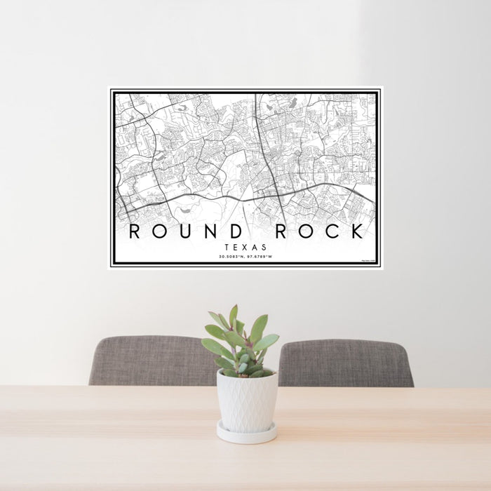 24x36 Round Rock Texas Map Print Lanscape Orientation in Classic Style Behind 2 Chairs Table and Potted Plant