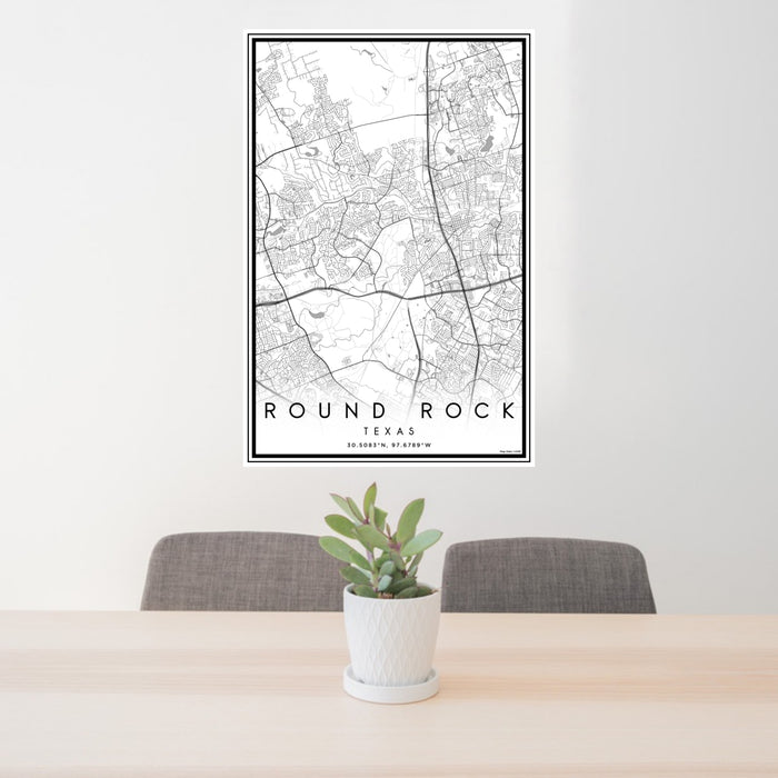 24x36 Round Rock Texas Map Print Portrait Orientation in Classic Style Behind 2 Chairs Table and Potted Plant