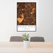 24x36 Round Rock Texas Map Print Portrait Orientation in Ember Style Behind 2 Chairs Table and Potted Plant