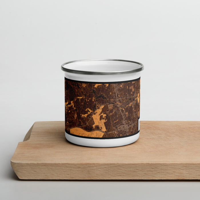 Front View Custom Round Rock Texas Map Enamel Mug in Ember on Cutting Board