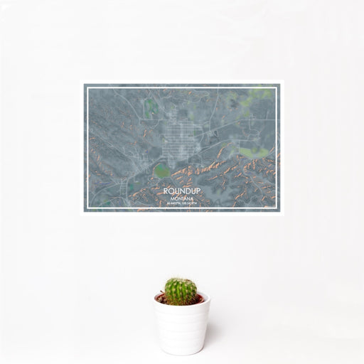 12x18 Roundup Montana Map Print Landscape Orientation in Afternoon Style With Small Cactus Plant in White Planter