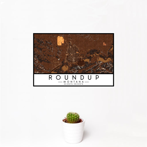 12x18 Roundup Montana Map Print Landscape Orientation in Ember Style With Small Cactus Plant in White Planter