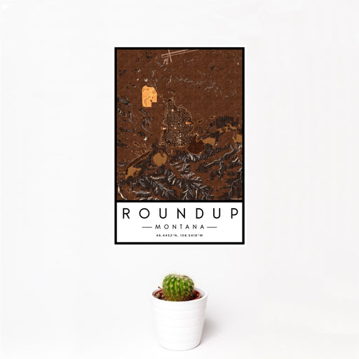 12x18 Roundup Montana Map Print Portrait Orientation in Ember Style With Small Cactus Plant in White Planter