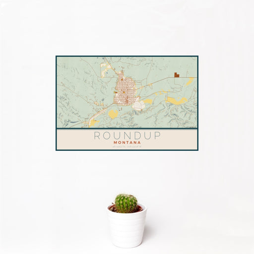 12x18 Roundup Montana Map Print Landscape Orientation in Woodblock Style With Small Cactus Plant in White Planter