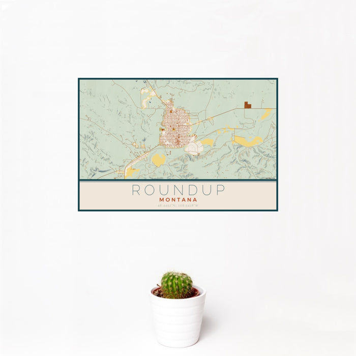 12x18 Roundup Montana Map Print Landscape Orientation in Woodblock Style With Small Cactus Plant in White Planter