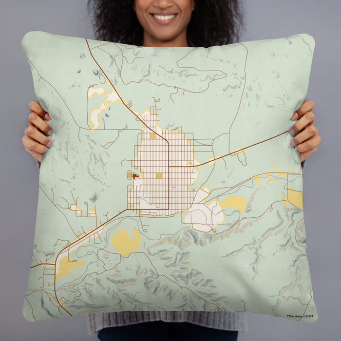 Person holding 22x22 Custom Roundup Montana Map Throw Pillow in Woodblock