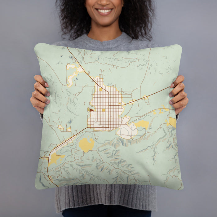 Person holding 18x18 Custom Roundup Montana Map Throw Pillow in Woodblock