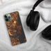 Custom Rowlett Texas Map Phone Case in Ember on Table with Black Headphones