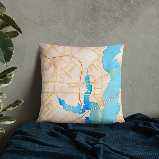 Custom Rowlett Texas Map Throw Pillow in Watercolor on Bedding Against Wall