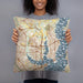Person holding 18x18 Custom Rowlett Texas Map Throw Pillow in Woodblock