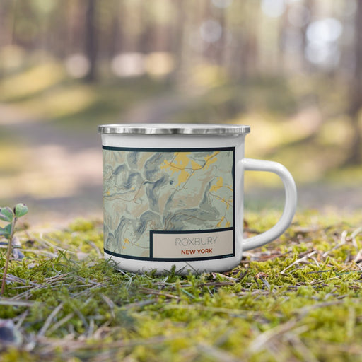 Right View Custom Roxbury New York Map Enamel Mug in Woodblock on Grass With Trees in Background