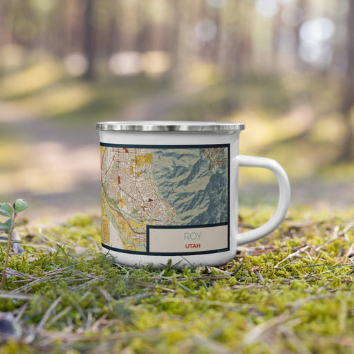 Right View Custom Roy Utah Map Enamel Mug in Woodblock on Grass With Trees in Background