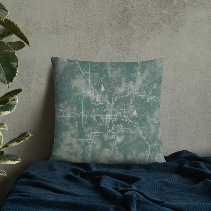 Custom Rusk Texas Map Throw Pillow in Afternoon on Bedding Against Wall