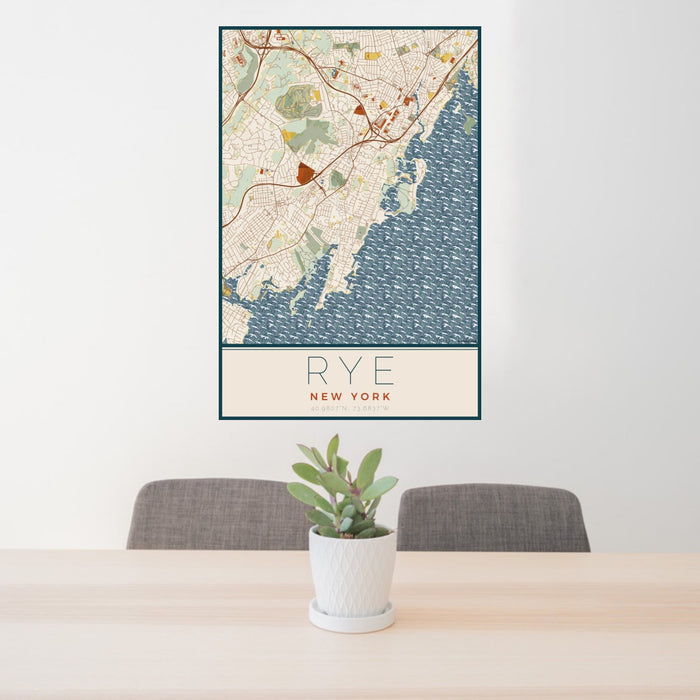24x36 Rye New York Map Print Portrait Orientation in Woodblock Style Behind 2 Chairs Table and Potted Plant