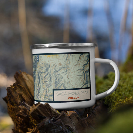 Right View Custom Sacajawea Peak Oregon Map Enamel Mug in Woodblock on Grass With Trees in Background
