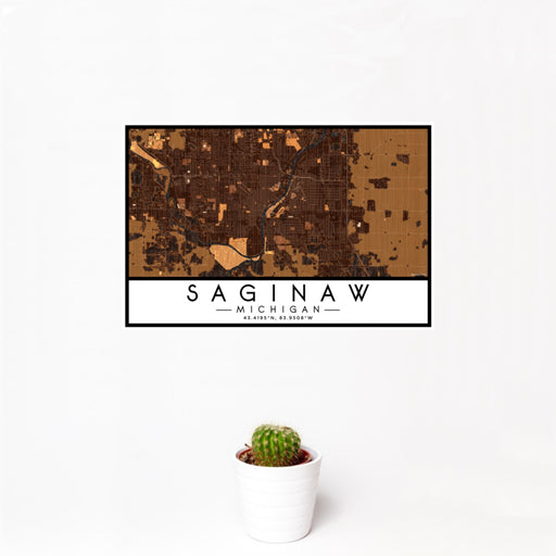 12x18 Saginaw Michigan Map Print Landscape Orientation in Ember Style With Small Cactus Plant in White Planter