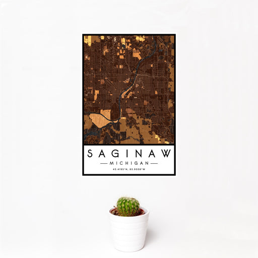 12x18 Saginaw Michigan Map Print Portrait Orientation in Ember Style With Small Cactus Plant in White Planter