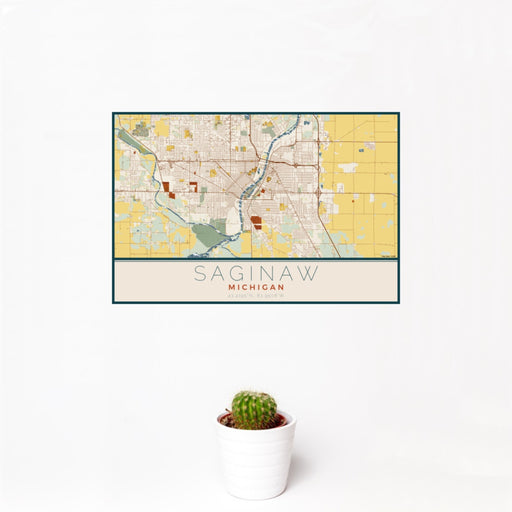 12x18 Saginaw Michigan Map Print Landscape Orientation in Woodblock Style With Small Cactus Plant in White Planter