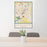 24x36 Saginaw Michigan Map Print Portrait Orientation in Woodblock Style Behind 2 Chairs Table and Potted Plant