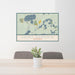 24x36 Saint Germain Wisconsin Map Print Lanscape Orientation in Woodblock Style Behind 2 Chairs Table and Potted Plant