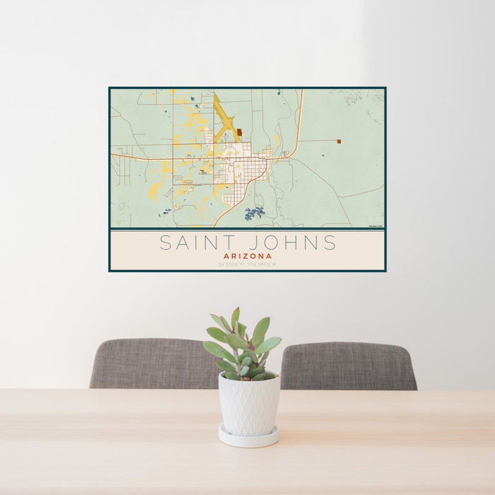 24x36 Saint Johns Arizona Map Print Lanscape Orientation in Woodblock Style Behind 2 Chairs Table and Potted Plant