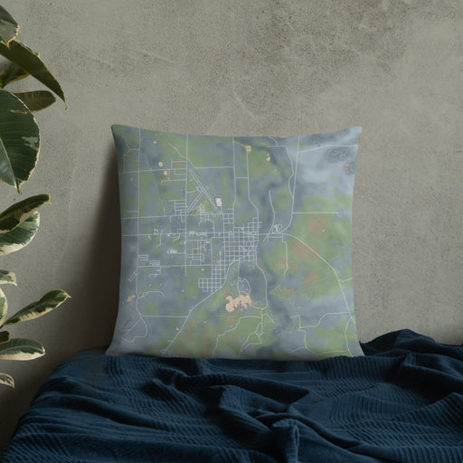 Custom Saint Johns Arizona Map Throw Pillow in Afternoon on Bedding Against Wall