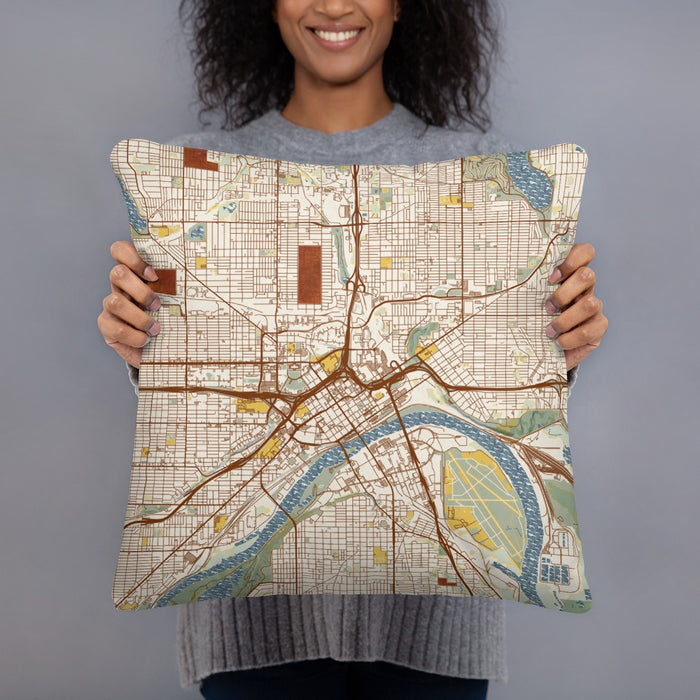 Person holding 18x18 Custom Saint Paul Minnesota Map Throw Pillow in Woodblock