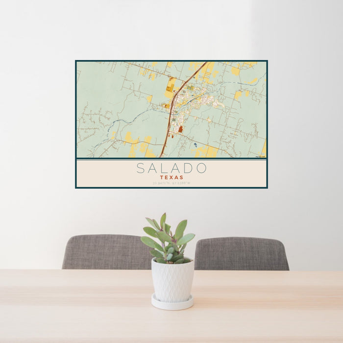 24x36 Salado Texas Map Print Lanscape Orientation in Woodblock Style Behind 2 Chairs Table and Potted Plant