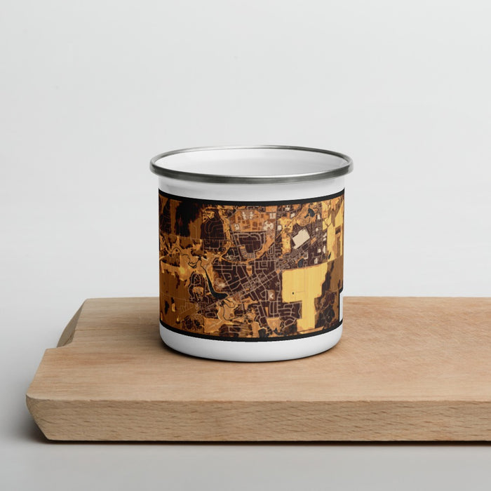 Front View Custom Saline Michigan Map Enamel Mug in Ember on Cutting Board