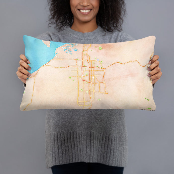Person holding 20x12 Custom Salt Lake City Utah Map Throw Pillow in Watercolor