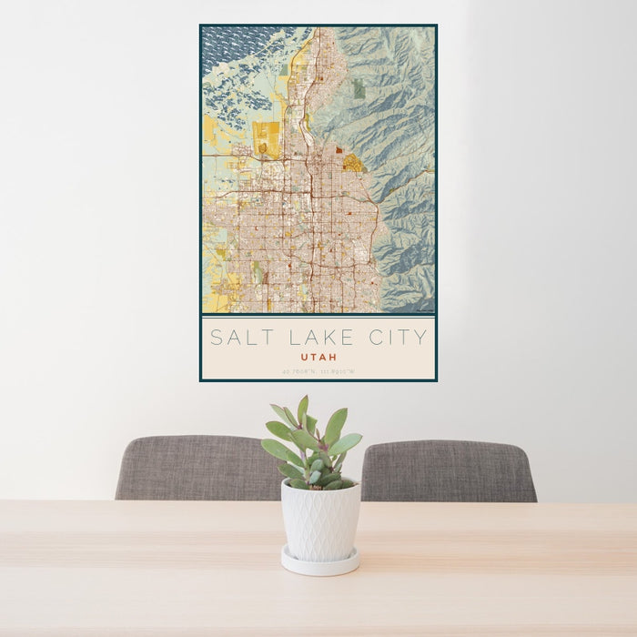 24x36 Salt Lake City Utah Map Print Portrait Orientation in Woodblock Style Behind 2 Chairs Table and Potted Plant