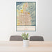 24x36 Salt Lake City Utah Map Print Portrait Orientation in Woodblock Style Behind 2 Chairs Table and Potted Plant