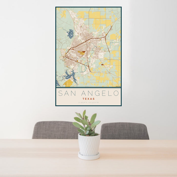 24x36 San Angelo Texas Map Print Portrait Orientation in Woodblock Style Behind 2 Chairs Table and Potted Plant