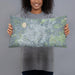Person holding 20x12 Custom San Angelo Texas Map Throw Pillow in Afternoon