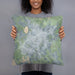 Person holding 18x18 Custom San Angelo Texas Map Throw Pillow in Afternoon