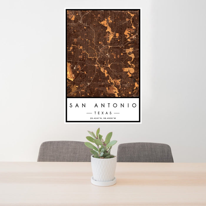 24x36 San Antonio Texas Map Print Portrait Orientation in Ember Style Behind 2 Chairs Table and Potted Plant