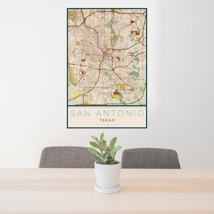 24x36 San Antonio Texas Map Print Portrait Orientation in Woodblock Style Behind 2 Chairs Table and Potted Plant