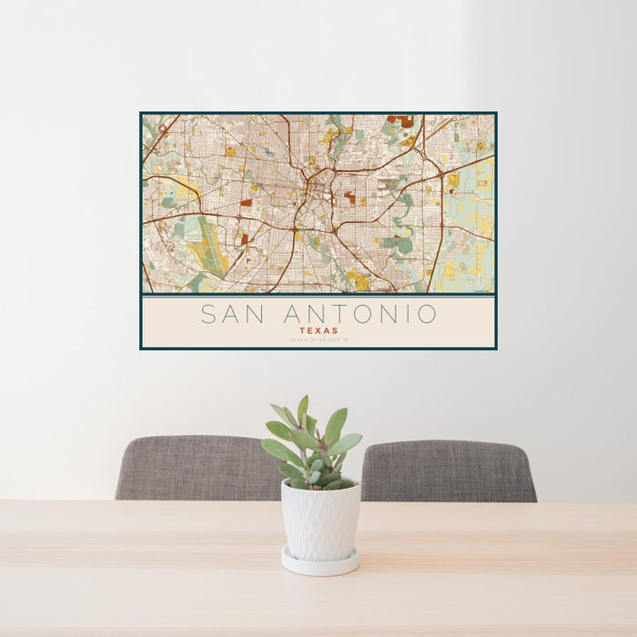 24x36 San Antonio Texas Map Print Landscape Orientation in Woodblock Style Behind 2 Chairs Table and Potted Plant