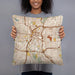 Person holding 18x18 Custom San Antonio Texas Map Throw Pillow in Woodblock
