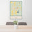 24x36 San Augustine Texas Map Print Portrait Orientation in Woodblock Style Behind 2 Chairs Table and Potted Plant
