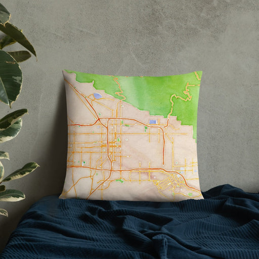 Custom San Bernardino California Map Throw Pillow in Watercolor on Bedding Against Wall