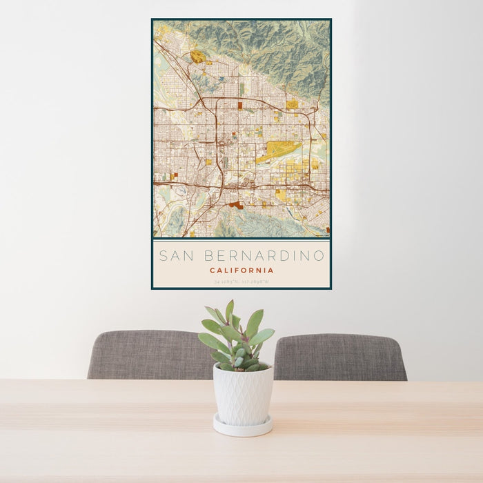 24x36 San Bernardino California Map Print Portrait Orientation in Woodblock Style Behind 2 Chairs Table and Potted Plant