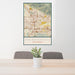 24x36 San Bernardino California Map Print Portrait Orientation in Woodblock Style Behind 2 Chairs Table and Potted Plant