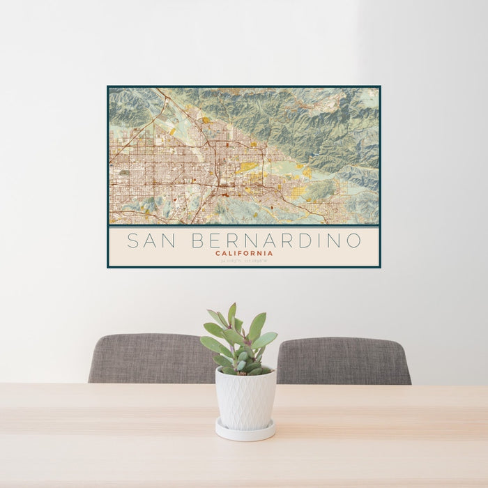 24x36 San Bernardino California Map Print Landscape Orientation in Woodblock Style Behind 2 Chairs Table and Potted Plant