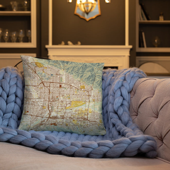 Custom San Bernardino California Map Throw Pillow in Woodblock on Cream Colored Couch
