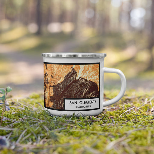Right View Custom San Clemente California Map Enamel Mug in Ember on Grass With Trees in Background