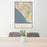 24x36 San Clemente California Map Print Portrait Orientation in Woodblock Style Behind 2 Chairs Table and Potted Plant